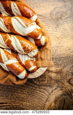 Pretzel Sticks And Pretzel Rolls, Bavarian Lye Bun With Salt In A Basket