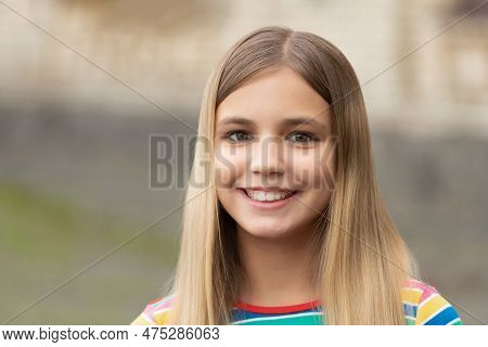 Portrait Of Happy Teen Girl. Portrait Of Teen Girl With Blonde Hair. Portrait Of Teen Girl Outdoor