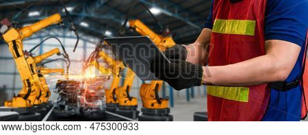 Engineer Use Advanced Robotic Software To Control Industry Robot Arm In Factory . Automation Manufac
