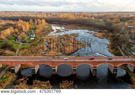 Venta Rapid Waterfall, The Widest Waterfall In Europe And Long Brick Bridge, Kuldiga, Latvia
