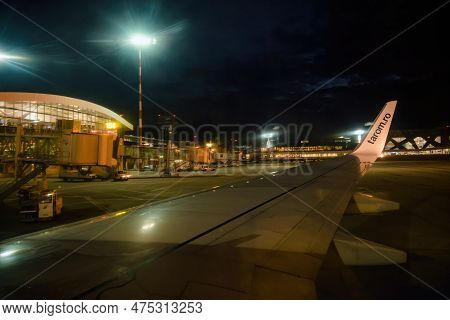 Frankfurt, Germany - Jul 3, 2015: The Evening Sky Is Illuminated By The Lights Of Frankfurt Airport.
