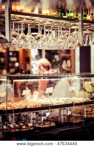 Empty Glasses For Wine Above A Bar Rack
