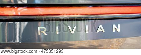 Panorama Rear View Futuristic-looking Rivian Branding Text Of Brand-new Electric Vehicle R1T Pickup