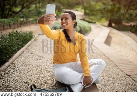 Excited Brazilian Lady Taking Selfie On Smartphone Outdoors, Student Woman Taking Break And Capturin