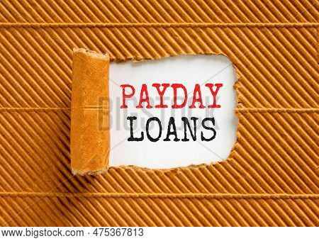 Payday Loans Symbol. Concept Words Payday Loans On Beautiful White Paper. Beautiful Brown Paper Card
