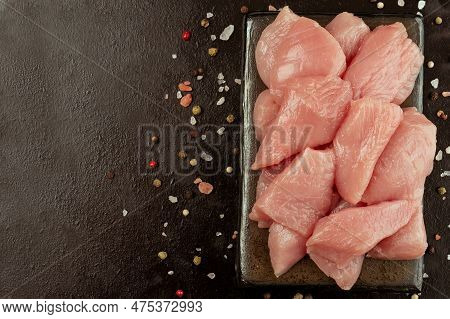Chicken Fillet.fresh Pieces Of Turkey Meat.raw Chicken.raw Pieces Of Turkey Meat On A Ceramic Board 