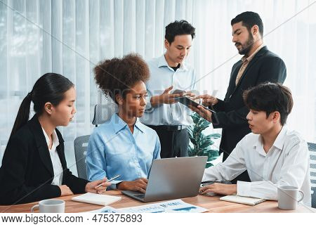Happy Diverse Business People Work Together, Discussing In Corporate Office. Professional And Divers