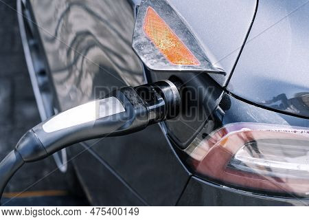 Charging Station For Electric Cars. Types And Connectors Of Ports For Charging Vehicles.