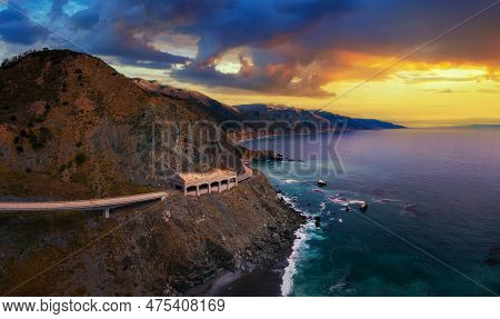 Sunset Over Pitkins Curve Bridge And Rain Rocks Rock Shed Along Pacific Coast Highway And Big Sur Co