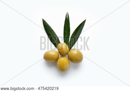 Closeup Of Green Olives With Olive Branch On White Background