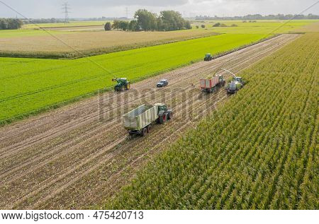 Hamburg, Germany - October 11, 2022: Maize Chopper And Fendt 930 Vario Tractor With Veenhuis Super S