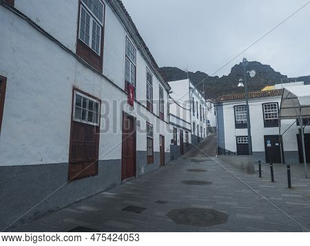 Cobbled Street With Colorful Traditional Houses In The Village Of Agulo Located In Green Valley At N