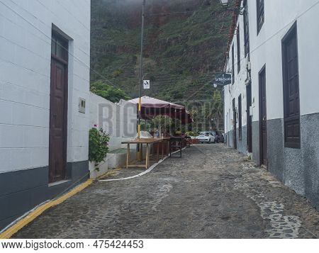 Agulo, La Gomera, Canary Islands, Spain, December 27, 2021: Cobbled Street With Colorful Traditional