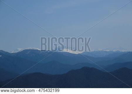 Minimalistic Landscape , No People. View Of Snowy Peak Of Mount Fisht From Afar. Main Caucasian Ridg
