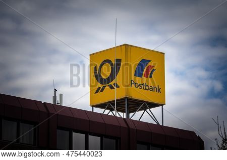 Dortmund, Germany - November 5, 2022: Logos Of Deutsche Postbank And Deutsche Post On Their Local Of