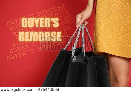 Text Buyer's Remorse And Woman With Shopping Bags On Red Background