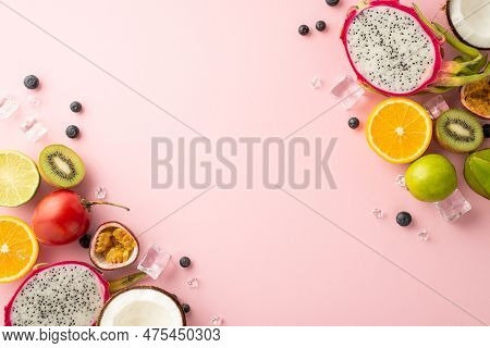 Summer In A Frame. An Eye-catching Flat Lay Of Vibrant Tropical Fruits Dragon Fruit, Kiwi Orange Lim