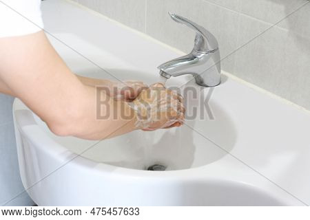 Hand Of Beauty Woman  Wash Your Hands At The Wash Basin With Foam, Cleanse The Skin And Have Water F