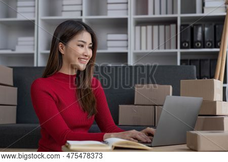 Startup Small Business Entrepreneur Sme, Asian Woman Packing Cloth In Box. Portrait Young Asian Smal
