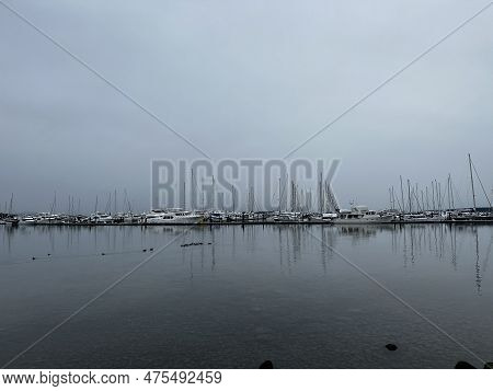 Sailboat Reflections At Port Sidney Marina On A Dreary Dark And Overcast Day - Sidney, Vancouver Isl