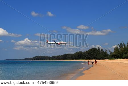 Puket Thailand - May 2022: Airliner Or Passenger Plane Boing 737 Landing To Airport Next To The Beac