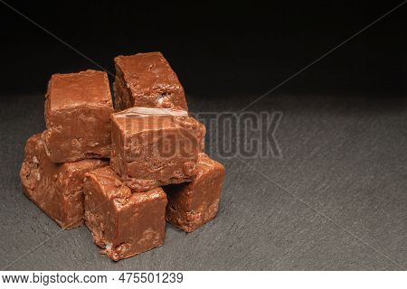 Large Chunks Of Chocolate And Peppermint Fudge On A Slate Counter
