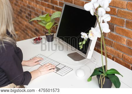 Successful Female Grapic Designer Watching Tutorial About Creative Ideas At Computer During Working 