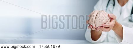 Brain Surgeon Or Neurologist Doctor Explaining To Patient