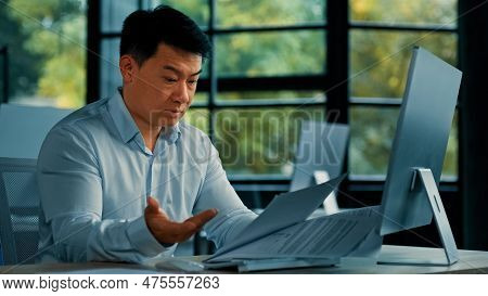Disappointed Angry Asian Office Manager Mature Man Specialist Lawyer Banker Work With Paper Document
