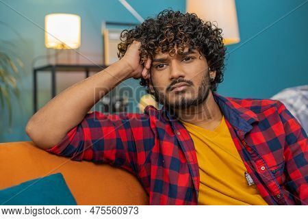 Sad Lonely Man Sitting At Home Room Looks Pensive Thinks Over Life Concerns Or Unrequited Love Suffe
