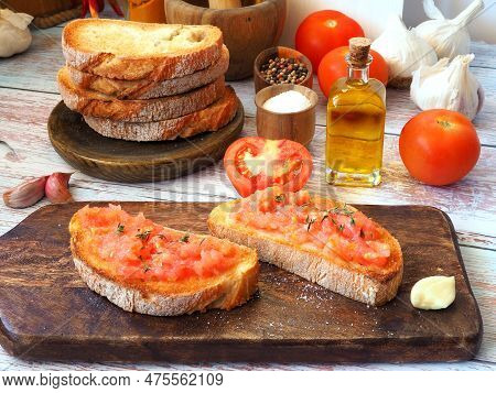 Toasted Bread Rubbed With Fresh Garlic And Ripe Tomato, Then Drizzled With Olive Oil. Spanish Appeti