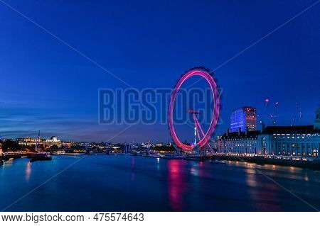 London, England - September 27, 2017: Spinning London Eye And Themas River. Night. England, United K