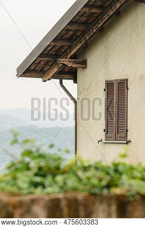 Panoramic View Of The Hills From An Old House With Wooden Roof And Window In San Sebastiano Da Po Ca