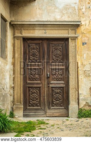 Old Wooden Door In An Old Street In San Sebastiano Da Po Castle, Torino, Piemonte Region, Italy, Ver