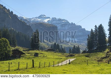 Switzerland Mountain Valley Kiental, Berner Oberland Alps. Snow Mountains, Sunny Weather, Travel To 