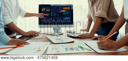 Panorama Shot Analyst Team Utilizing Bi Fintech To Analyze Financial Report With Laptop. Businesspeo
