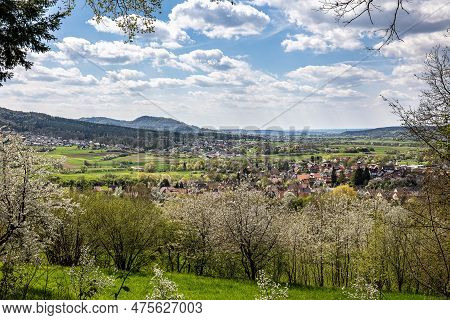Cherry Blossom On The Hills At Pretzfeld, Germany In Franconian Switzerland. A Famous Region For Fru