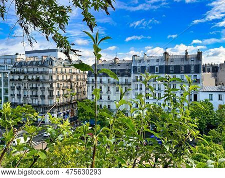 Paris, France - April 12 2023: Classic Haussmann Architectural Style Typical Parisian Residential Bu