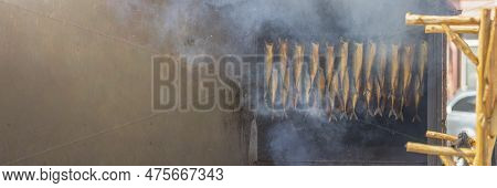 Advertising Banner With The Process Of Processing Fish By Smoking. Various Types Of Fish In The Proc