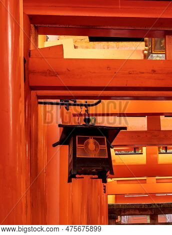 Red Torii Gates At Fushimi Inari Taisha, A Shinto Shrine In Kyoto, Japan