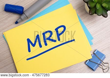 Mrp - Marketing Research Planning - Acronym Text Concept With Marker On Yellow Business Card