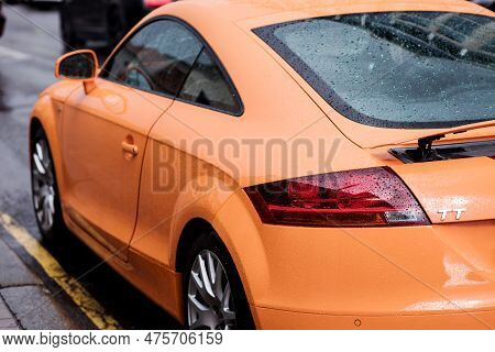 Minsk, Belarus, April 2023 - Rear Lights Of An Audi Tt Super Car. Raindrops On A Sports Car