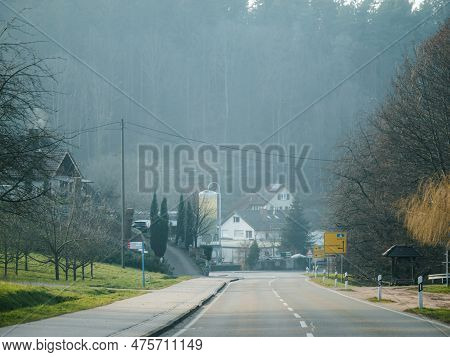 Rural Germany - A Tranquil Morning In Germanys Urban Landscape. Fog Drifts Amongst The City Architec