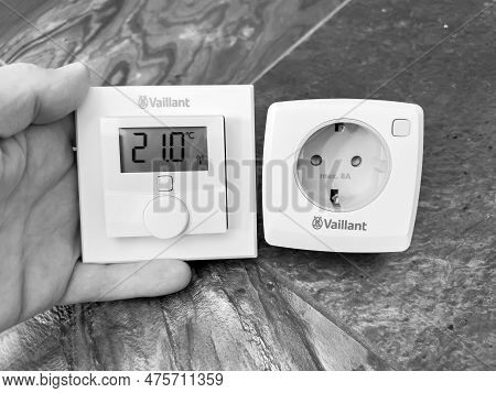 London, United Kingdom - Jan 1, 2022: A Close-up Of A Male Hand Unboxing The New Vaillant Ambisense 