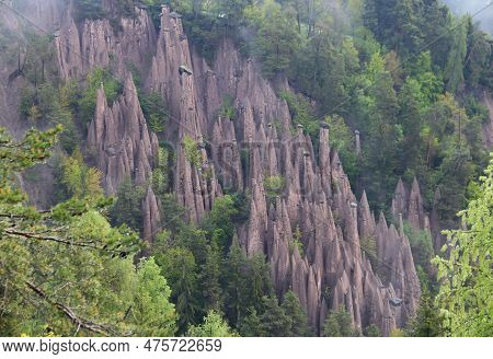 Landscape With View Of The Earth Pyramids Renon In The Morning Fog Near The City Of Bolzano In The D