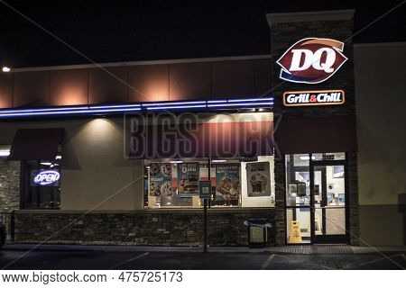 Augusta, Ga Usa - 11 20 20: Dairy Queen Fast Food Restaurant At Night Illuminated Sign