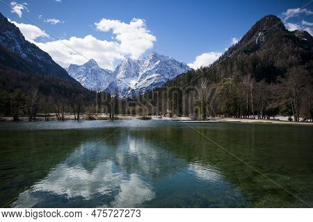 Lake Jasna With Alpine Backdrop In Slovenia