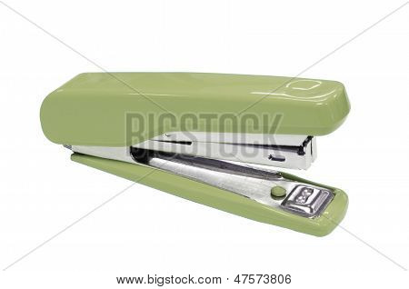 Dark green stapler isolated on white