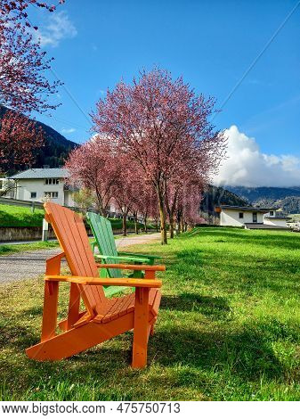 Green And Orange Chairs In Zams, Austria