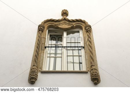 Typical Portuguese Facade With Arabic Style Window In Evora Town
